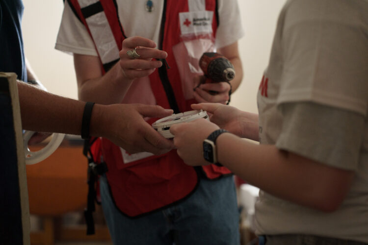 Agencies conduct ‘alarm blitz’ to outfit North Lawrence homes with